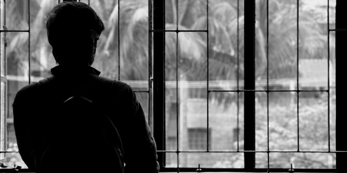 A lone figure stands in a deserted urban landscape, emphasizing profound loneliness and the quiet desolation of a lost world.